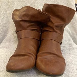 Well loved “Peter Pan” esque boots